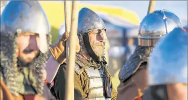  ?? Stock image ?? Viking re-enactments, such as this one above from an unrelated festival, are held all over the world and attract a wide following of all ages