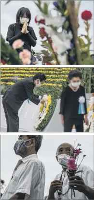  ?? PICTURES: GETTY IMAGES/AFP ?? SOLEMN REFLECTION: From top, a woman praying during the Hiroshima ceremony; Japanese Prime Minister Shinzo Abe lays a wreath; a man holds a flower as he queues to pray.