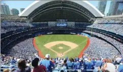  ?? STEVE RUSSELL, TORONTO STAR ?? The Blue Jays are watched on television by hundreds of thousands across the country from their home in Toronto. The TV crew hits the road with the team, too.