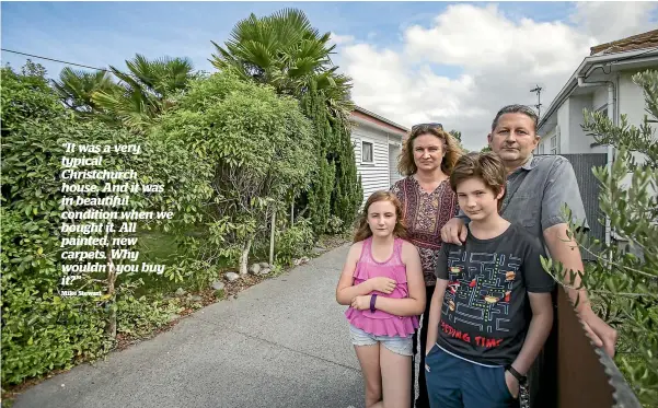  ?? PHOTO:DAVID WALKER/STUFF ?? Expensive business: Mike Stewart and Julia McEntyre with their kids. Now carrying two mortgages.