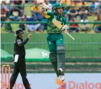  ?? AP ?? South Africa’s Reeza Hendricks leaps in the air to celebrate his maiden ton during the third ODI against Sri Lanka on Sunday. —