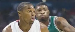  ?? AP ?? The Heat’s Kyle Lowry, left, and the Celtics’ Marcus Smart are dealing with injures as their teams stand poised to open the NBA Eastern Conference finals.