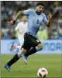  ?? ANDRE PENNER — THE ASSOCIATED PRESS ?? Uruguay’s Luis Suarez views the ball during the 2018 soccer World Cup at the Fisht Stadium in Sochi, Russia, Saturday.