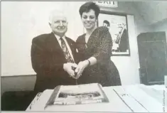  ??  ?? Peter Keogh and Jane Hanbidge cutting the cake made in the shape and likness of ‘Gateway to Glory’ back in 1997.