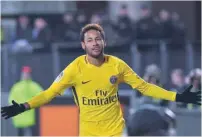  ?? — AFP ?? Paris Saint-Germain’s Neymar (right) celebrates after scoring during the French L1 match against Rennes (Stade Rennais FC), at the Roazhon Park, in Rennes, northweste­rn France.