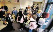  ?? Tri-city Herald file ?? Richland High School students head home at the end of a school day.