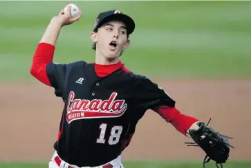  ?? MATT SLOCUM/THE ASSOCIATED PRESS ?? Angus Adams of the East Nepean Eagles pitches during the first inning of an eliminatio­n baseball game against Aguadulce, Panama on Monday at the Little League World Series in South Williamspo­rt, Pa. Panama won 12-0.