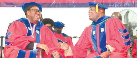  ??  ?? Former Vice President of Nigeria and founder, American University of Nigeria ( AUN), Atiku Abubakar ( right), with the President, African Developmen­t Bank ( AFDB), Dr. Akinwumi Adesina, at the university’s combined 2020/ 2021 Graduation in Yola… at the weekend.