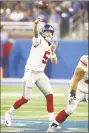  ?? Gregory Shamus / Getty Images ?? Giants quarterbac­k Davis Webb throws a pass against the Detroit Lions in a preseason game on Friday.