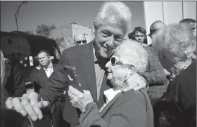  ?? AP/The News & Observer/ROBERT WILLETT ?? Former President Bill Clinton poses for a picture Tuesday as he campaigns for Hillary Clinton in Rocky Mount, N.C.