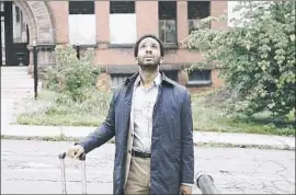  ?? Patrick Harbron Hulu ?? HENRY DEAVER (André Holland), a death-row attorney, returns to his spooky hometown after a mysterious Shawshank inmate says he will speak to no one else.