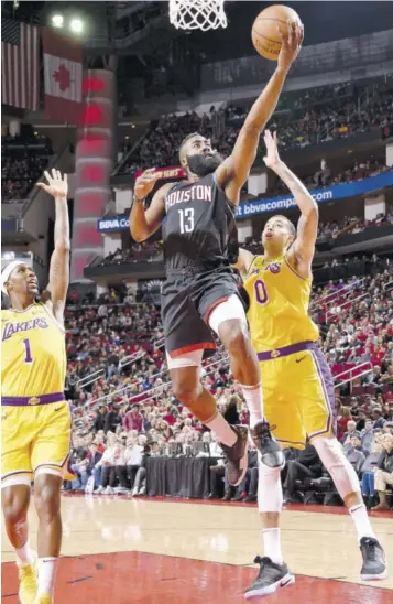  ?? (Photo: AFP) ?? James Harden (#13) of the Houston Rockets goes to the basket against the Los Angeles Lakers on Saturday at the Toyota Center in Houston, Texas.