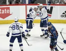  ?? Aaron Ontiveroz, The Denver Post ?? Tampa Bay’s Ondrej Palat (18) celebrates his goal with Steven Stamkos, right.