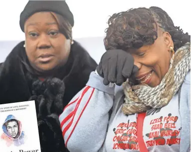  ?? CLIFF OWEN AP ?? Sybrina Fulton, left, mother of TrayvonMar­tin, and Gwen Carr, mother of Eric Garner, attend a rally inWashingt­on to honor Martin Luther King Jr. on Jan. 14. Left, participan­ts in a Los Angeles MLK march carry a photo of Trayvon.