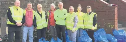  ?? Andrew Walmsley ?? ●● Bacup Pride and volunteers at the Royal Court Theatre are among those helping to keep Rossendale litter-free