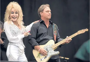  ??  ?? Dolly Parton has poured her heart and soul into her new album.