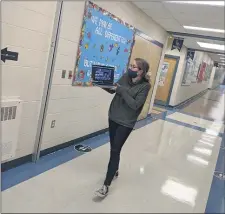  ?? SUBMITTED PHOTO ?? Nether Providence Elementary School third grade teacher Jenna Adams greeted her Cohort B students back to school on Thursday, Oct. 2. Here she is giving a tour of her classroom and hallway to Cohort A who she welcomed back on Monday, Oct. 5.