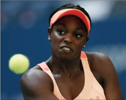  ?? ADAM HUNGER — THE ASSOCIATED PRESS ?? Sloane Stephens returns a shot from Anastasija Sevastova during the quarterfin­als of the U.S. Open tennis tournament. Stephens won in three sets.