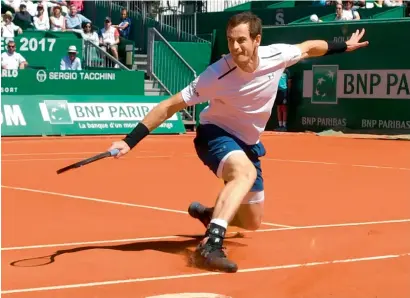  ?? AFP ?? Andy Murray hits a return to Luxembourg’s Gilles Muller. —