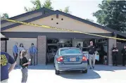  ?? [AP PHOTO] ?? Police search a house in connection with the arrest of Joseph James DeAngelo, Wednesday in Citrus Heights, Calif. DeAngelo is alleged to have committed at least 12 homicides, 45 rapes and dozens of burglaries across California in the 1970s and 1980s.