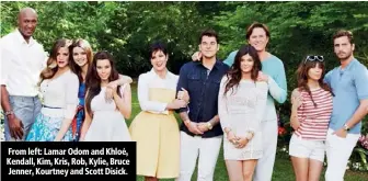  ??  ?? From left: Lamar Odom and Khloé, Kendall, Kim, Kris, Rob, Kylie, Bruce Jenner, Kourtney and Scott Disick.