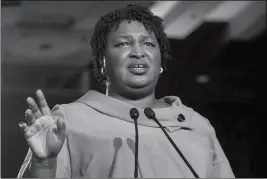  ?? ASSOCIATED PRESS ?? IN THIS NOV. 6, 2018, file photo, then Georgia Democratic gubernator­ial candidate Stacey Abrams addresses supporters during an election night watch party in Atlanta.