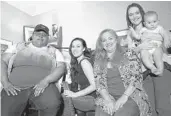  ?? CHARLES KING / ORLANDO SENTINEL ?? Singer Beth McKee (center) sits with some of her fellow Swamp Sistas (left to right): Lauren “TKO” Rohan, Renee Arozqueta, Hannah Harber Wynn and her son Abel Wynn.