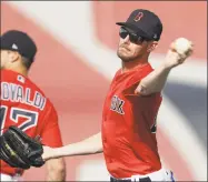  ?? John Bazemore / Associated Press ?? Boston Red Sox starting pitcher Chris Sale will start the season on the injured list, manager Ron Roenicke said Thursday.