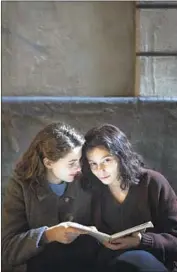  ?? Eduardo Castaldo HBO ?? AS THE CENTRAL pair enter adolescenc­e they are played by Margherita Mazzucco, left, Gaia Girace.