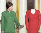  ?? MIKE THEILER/AFP ?? Former first lady Laura Bush shows the gown she wore to the 2001 Inaugural balls.