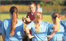  ?? Jeremy Stewart / Rome News-Tribune ?? Lucas LeVesque gives instructio­ns to the Rome YMCA Arsenal U14 girls during a recent practice session at Grizzard Park.