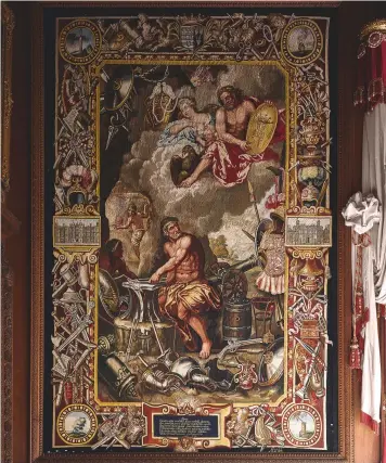  ??  ?? Fig 4: One of the tapestries commission­ed by the 5th Earl depicting Vulcan. The motifs in the borders celebrate his architectu­ral patronage and the houses he inherited