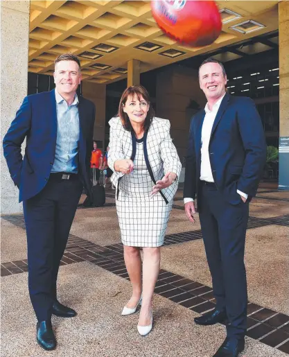  ?? Picture: ZAK SIMMONDS ?? GOLD COAST GOALS: Mayor Jenny Hill with Suns general manager commercial Andrew Thomas and chief commercial officer Simon Fitzgibbon yesterday. The club will play two games in Townsville over the next two years.