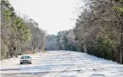  ?? Brett Coomer/staff photograph­er ?? Maintain proper tire pressure and check the tires’ tread to keep from sliding on ice.