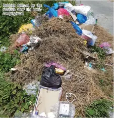  ??  ?? Rubbish dumped by the roadside after the tombsweepi­ng ritual.