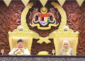  ?? — Bernama photo ?? His Majesty Sultan Ibrahim, King of Malaysia delivering his royal address at the opening of the First Meeting of the Third Session of the 15th Parliament, Monday. On the right is Her Majesty Raja Zarith Sofiah.