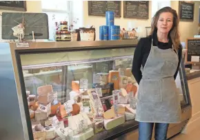  ?? MICHAEL SEARS, MILWAUKEE JOURNAL SENTINEL ?? Sabina Magyar opened the Village Cheese Shop at 1430 Underwood Ave., Wauwatosa, in summer.