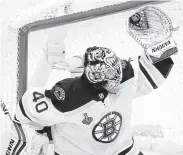  ?? Scott Kane / Associated Press ?? Goaltender Tuukka Rask helps the Bruins protect a 1-0 lead with a save in the second period of Sunday’s Game 6 victory over the Blues.