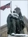  ?? PETE BANNAN – DIGITAL FIRST MEDIA ?? Old Glory flies in front of the Historic Chester County Courthouse during Wednesday’s snowstorm.