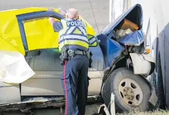  ?? AL CHAREST ?? Calgary Police investigat­e after a man was killed in a single-vehicle crash on northbound Stoney Trail underneath McKnight Boulevard N.E. on Monday.