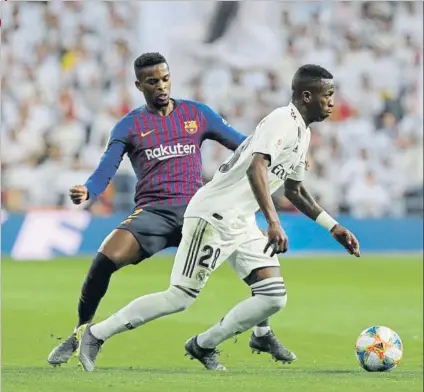  ?? FOTO: PEP MORATA ?? Vinicius, en pugna con Semedo en uno de los últimos enfrentami­entos entre Barça y Madrid