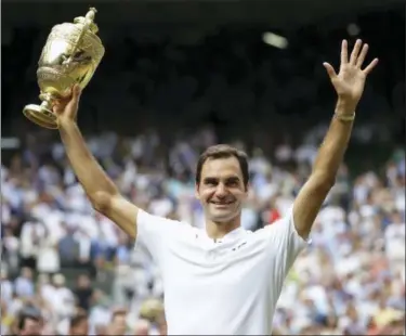  ?? THE ASSOCIATED PRESS FILE PHOTO ?? Roger Federer won his eighth Wimbledon title and 19th Grand Slam title last week.