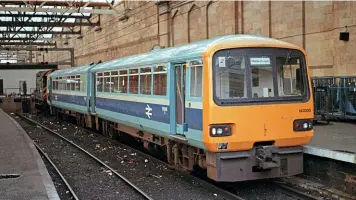  ??  ?? The initial order of 25 Class 143s all went to Heaton depot, the first 19 of which carried Provincial Services two-tone blue livery, including No. 143005 as seen at Carlisle on October 18, 1986.