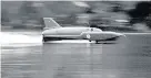  ?? PA ?? > Donald Campbell ‘s Bluebird boat on Coniston Water