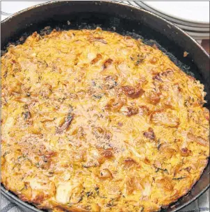  ?? "1 1)050 ?? This June 24, 2017 photo shows a lightened sweet zucchini and chorizo Spanish tortilla in Coronado, Calif. This dish is from a recipe by Melissa d’Arabian.