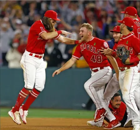  ?? Ronald Martinez/Getty Images ?? Reid Detmers’ no-hitter Tuesday night turned a spotlight on a budding Angels pitching staff.