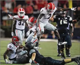  ?? CURTIS COMPTON / CCOMPTON@AJC.COM ?? While the opening 30-6 road win over Vanderbilt in an SEC East clash Aug. 31 was dominant for Georgia, many imperfecti­ons and inconsiste­ncies were revealed. Playing Murray State on Saturday will be a chance to smooth the rough edges.