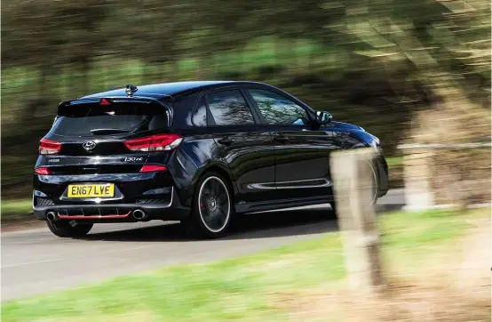  ??  ?? Above: Phantom Black paint brings a dose of much-needed attitude, reckons i30 keeper Ingram; 19in wheels a clue to this car’s Performanc­e spec