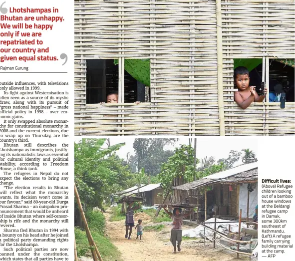  ??  ?? Difficult lives: (Above) Refugee children looking out of a bamboo house windows at the Beldangi refugee camp in Damak, some 300km southeast of Kathmandu. (Left) A refugee family carrying building material at the camp. — AFP