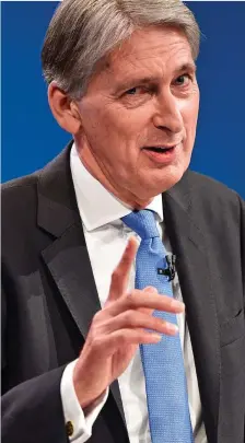  ??  ?? A FORMER Tory chancellor yesterday accused Philip Hammond of being ‘grossly negligent’ in refusing to release billions now to prepare the UK for the possibilit­y of leaving the EU without a deal.
‘I fear he is unhelpful,’ Lord Lawson said. ‘He may not...